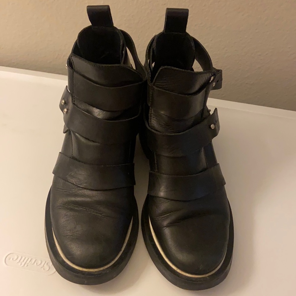 Maje black leather cutout boots with white trim